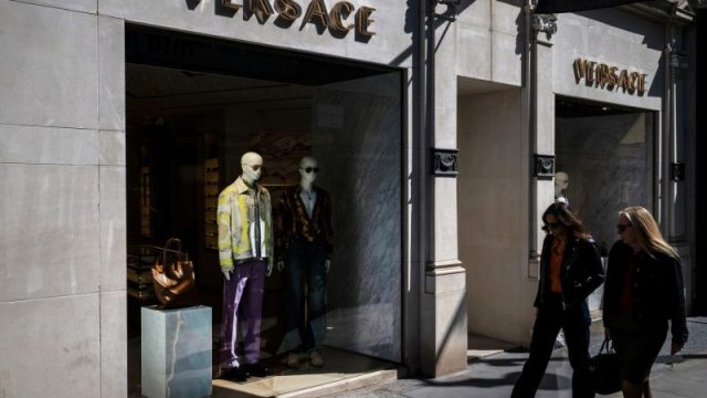 Prada Group says it has purchased fashion rival Versace in a deal worth nearly $1.4 billion